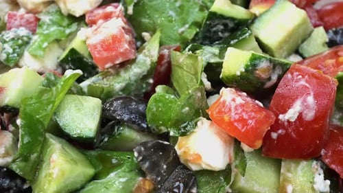 Fresh Greek Salad Close-Up with Tomatoes and Feta
