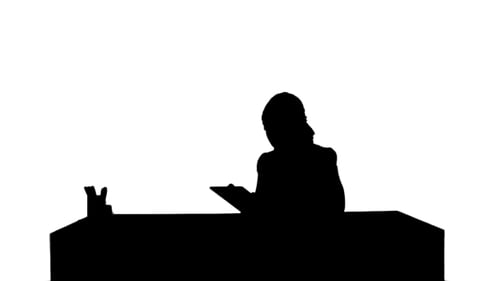 Silhouette Business Woman Sitting In Her Office