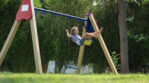 Girl Riding on a Swing