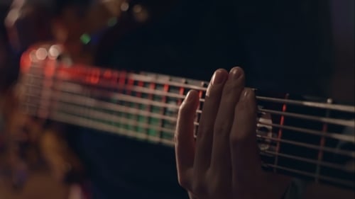 Man Plays Electric Guitar With His Special