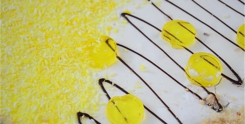 Decorated Dessert Cake with Yellow Shreds and Candies