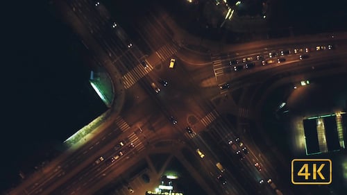 Night Aerial View of Illuminated City Intersection