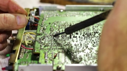 Repairing Green Circuit Board with Soldering Iron