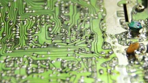 Macro View of a Green Electronic Circuit Board