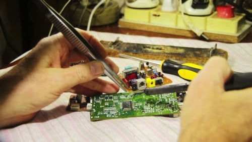 Soldering Electronics On Circuit Board
