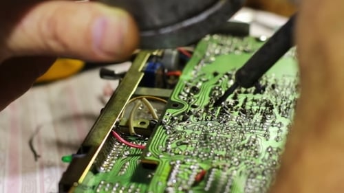 Soldering Electronics On Circuit Board