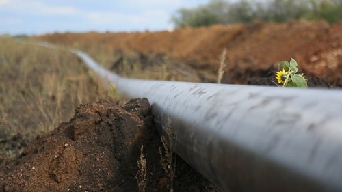 Long Pipe Laid in Rural Agricultural Field