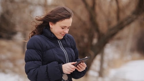Woman On The Tablet In Winter Park