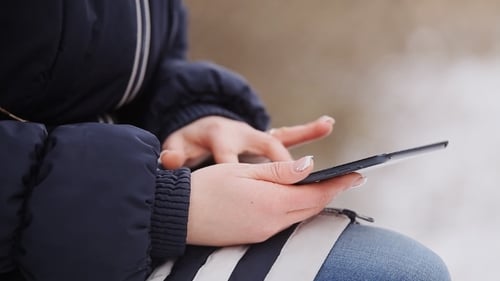 Beautiful Girl Writes The Message On The Tablet