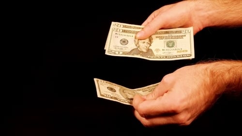 Counting Money Cash Dollars Bills In Hands.