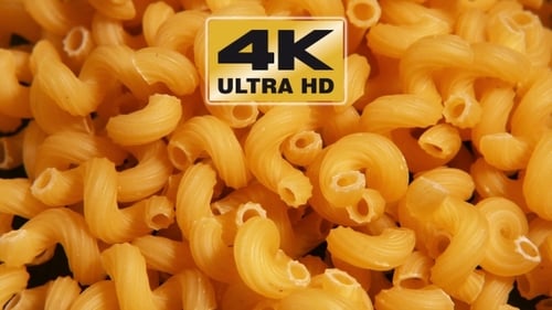 Close Up of Pile of Uncooked Spiral Pasta