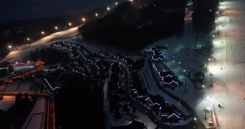 Night Illumination Cityscape Center Square Mountain Popular Ski Resort. Details of Modern House