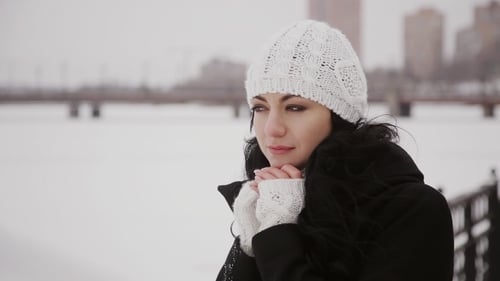 Woman in Winter Hat Posing Outdoors in Cold Weather
