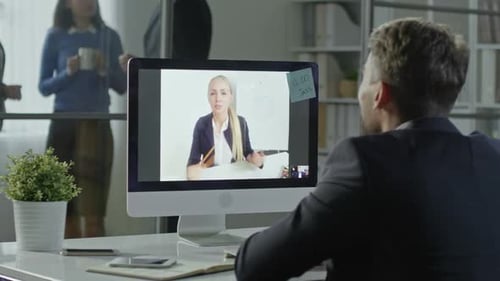 Business Meeting on a Computer