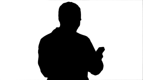 Silhouette Happy Doctor Using His Smartphone