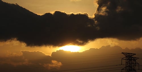 Dramatic Clouds at Sunset or Sunrise with Power Tower