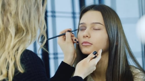A Young Girl Apply Makeup