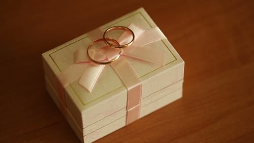 Wedding Rings on a Gift Box, Close Up