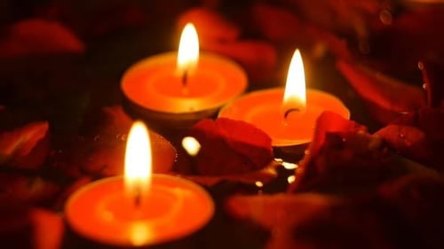 Candle And Rose On Water