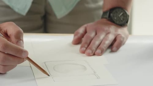 Artist Sketching Design with Pencil