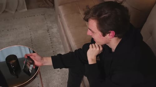 Young Adult Video Calling at Home