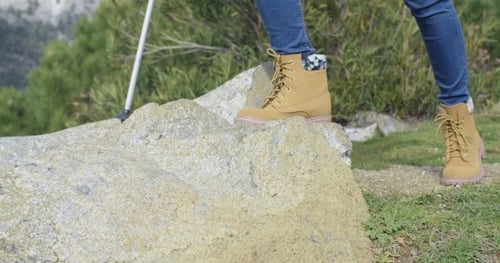 Active Person Hiking In Rock Terrain