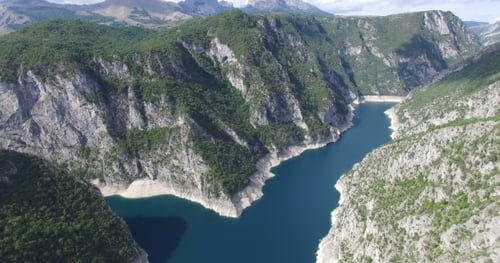 Aerial View Of Famous Piva Canyon With Its Fantastic Reservoir In Montenegro