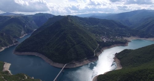 Aerial View Of Famous Piva Canyon With Its Fantastic Reservoir In Montenegro