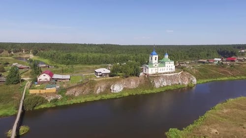 Church on a rock on the banks of the river "Chusovaya" in the Ural village Sloboda 03