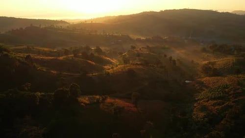4K Morning mist over a rural village in the high mountains.