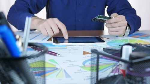 Man Making Online Purchase With Credit Card