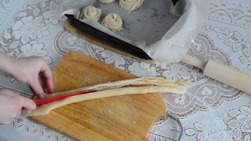 Housewife Preparing Bun Of Puff Pastry