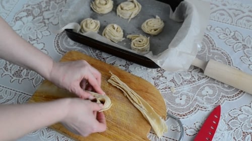 Housewife Preparing Bun Of Puff Pastry