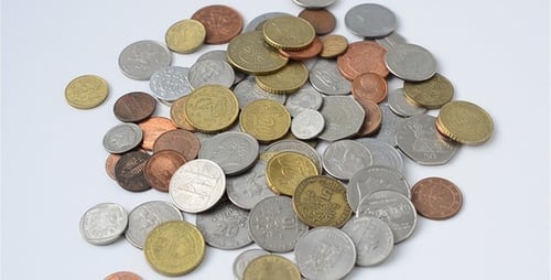 Pile of Different World Coins on White Surface