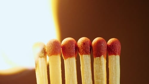 Matchsticks Igniting and Burning Close Up