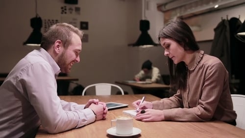 Business People Working With Tablet In Cafe