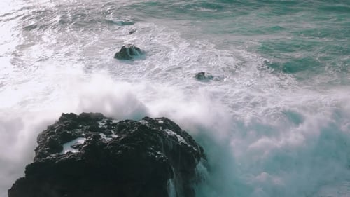 Ocean Waves Breaking On Rocks