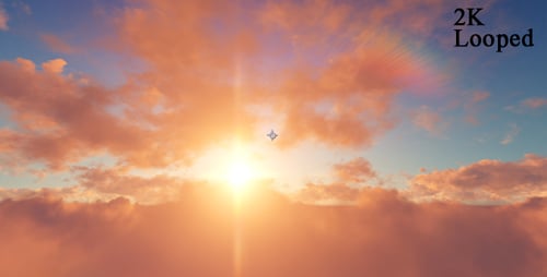 Flying Above Clouds at Sunset with Golden Sky and Sun Rays