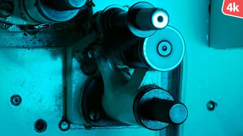 Close Up of Film Perforator Punching Holes