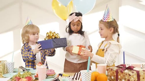 Kids Celebrate at Festive Birthday Party Indoors