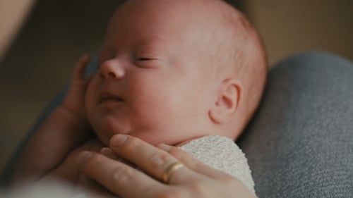 Mother Holding Newborn Baby