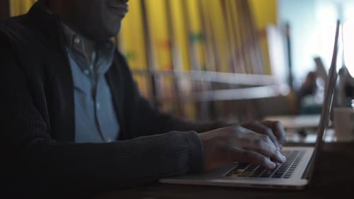 Typing On A Laptop
