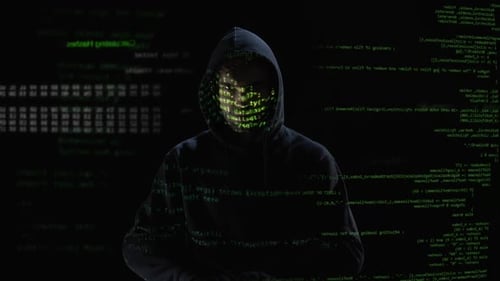 Hacker in Hoodie with Computer Code Overlay