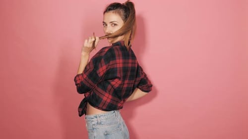 Young beautiful smiling woman.Attractive girl posing in studio