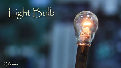 Macro Shot of Lightbulb Illuminating and Turning Off