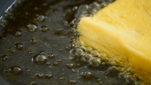 Frying Toast in Hot Oil in a Skillet