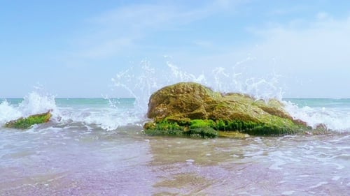 Sea Waves Breaking on the Stone