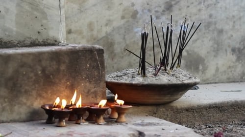Burning Oil Lamps and Incense for Religious Worship
