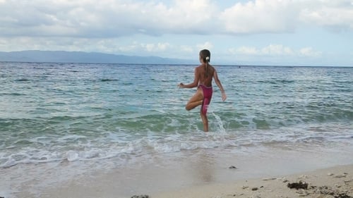 Happy Childs Runs To Swim.