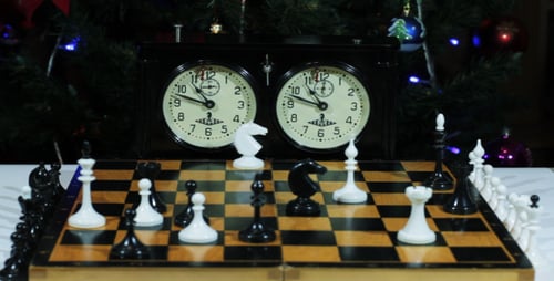 Chess Game by Christmas Tree in the Evening